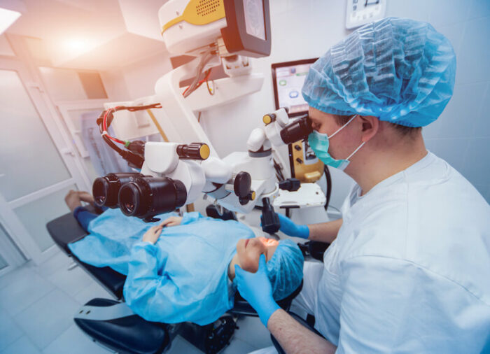 Woman getting eye surgery